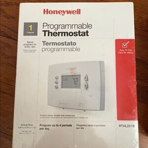 Honeywell programmable thermostat. Program up to four periods per day